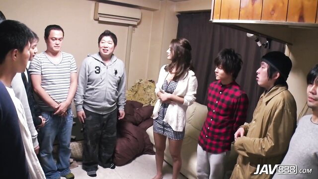Nozomi Aso surrounded by 7 horny men in JAV gangbang setup