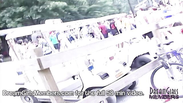 Nude women on bus at Miss Nude USA pageant flashing tits in forest