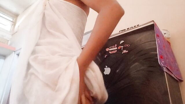Indian college girl in towel by fridge, teasing squirt piss fingering
