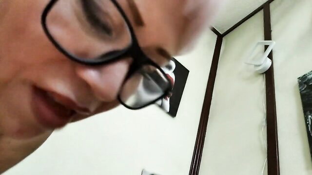 Hot mature MILF with glasses closeup face, big tits cocksucker
