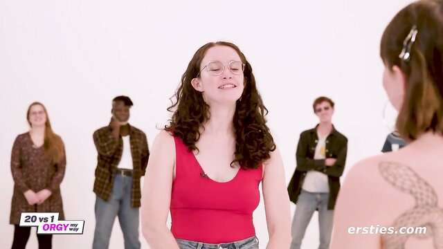 Hot curly brunette in red tank top at amateur orgy gameshow party