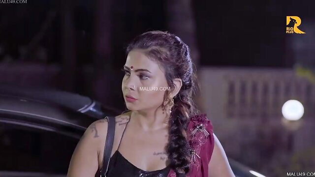 Indian maid with big boobs in red saree, black top by car