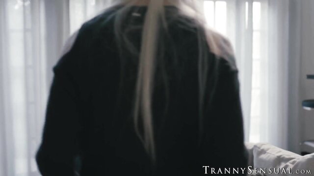 Aubrey Kate long blonde hair back view in black hoodie Transsensual