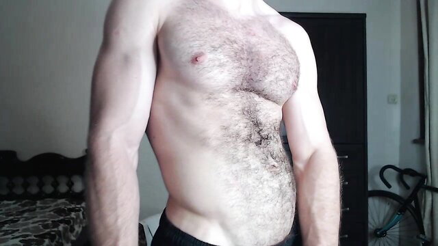 Hairy muscular Chaturbate cam model Overvoidking flexing shirtless