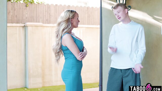 Angry blonde MILF stepmom in tight dress confronts stepson outdoors