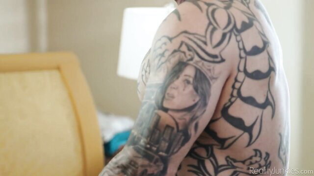 Tattooed muscular man with August Skye face tattoo in Ebony MILF porn thumbnail