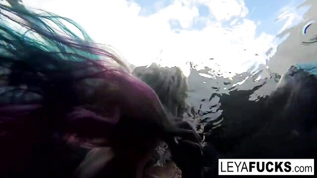 Porn Leya's colorful hair in wet lesbian pool romp with Lynn