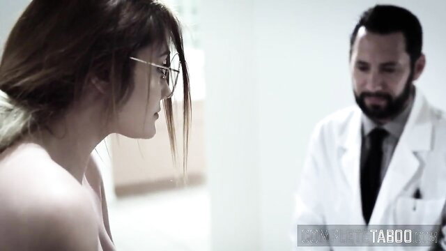 Nubile teen patient topless with fetish doctor in exam room