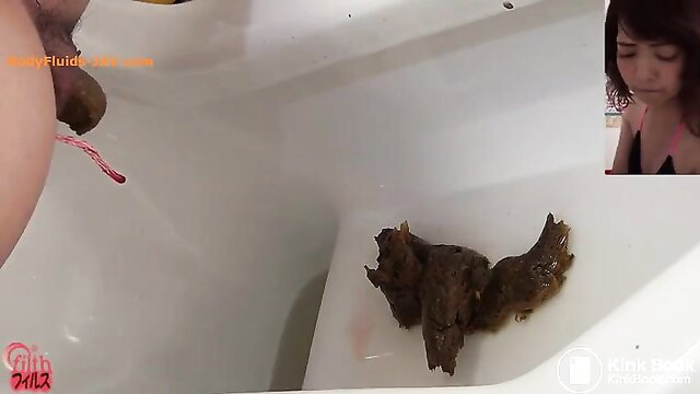 Asian JAV girl poops in bathtub with dick and tampon string visible
