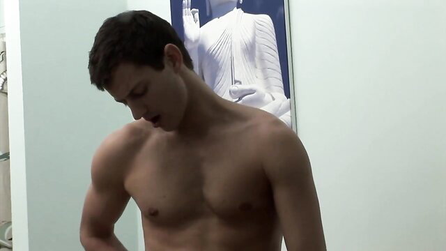 Shirtless muscular toyboy hunk flexing abs in Jane Bond MILF scene