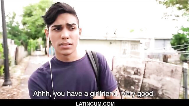 Young straight Latino boy in purple tee shocked outdoors, gay filmmaker cash offer