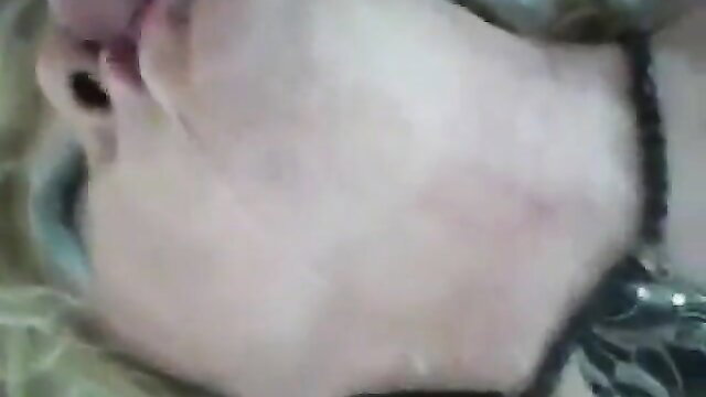 Blonde crossdressing bitch with open mouth and choker closeup