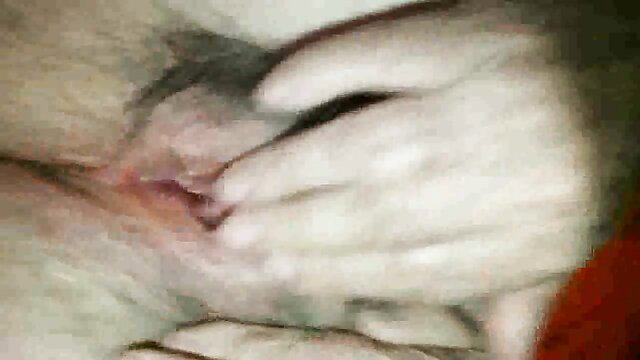 Blurry closeup of mature Italian woman fingering wet pussy in car