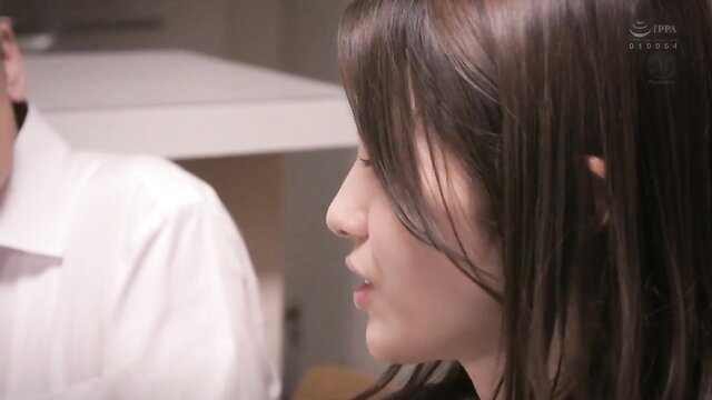 Closeup of sexy amateur Asian MILF profile with full lips