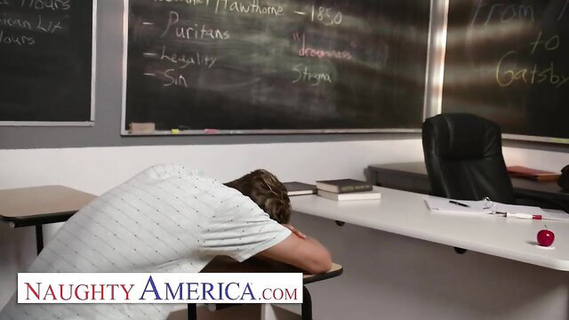 Dee Williams in Naughty America classroom scene with sleeping guy