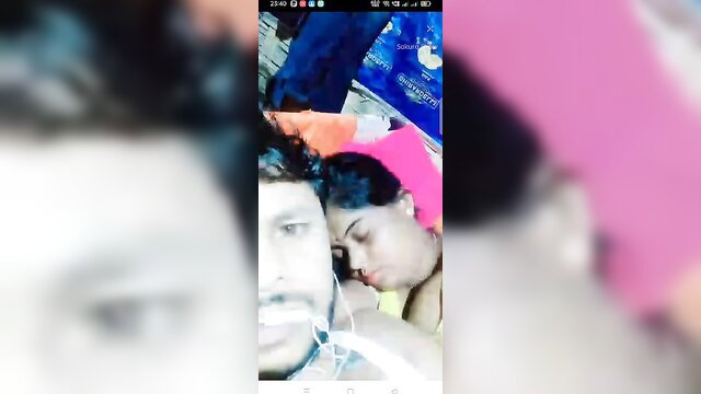 Blurry young Desi wife rests on horny husband's chest in intimate MMS clip