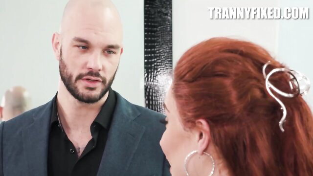 Cliff Jensen chats intimately with redhead Ariel Demure in suit