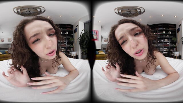 Leana Lovings topless POV closeup with expressive eyes and curls