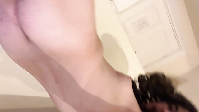 Cute t-girl in lingerie bends over, big ass exposed in HD thumbnail