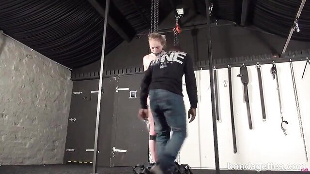 Carly Rae Summers bound, strapped and packaged in BDSM dungeon