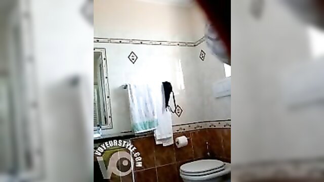 Elderly woman taking a bath