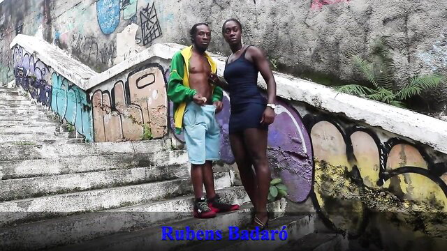 Ebony couple Rehen's Badaro posing sexy on graffiti stairs