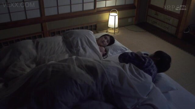 Asian wife in bed with man at inn, secret JAV seduction scene