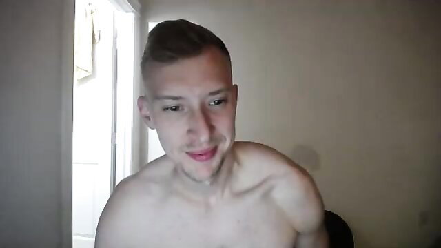 Shirtless young white twink smirking nude in amateur gay video thumbnail