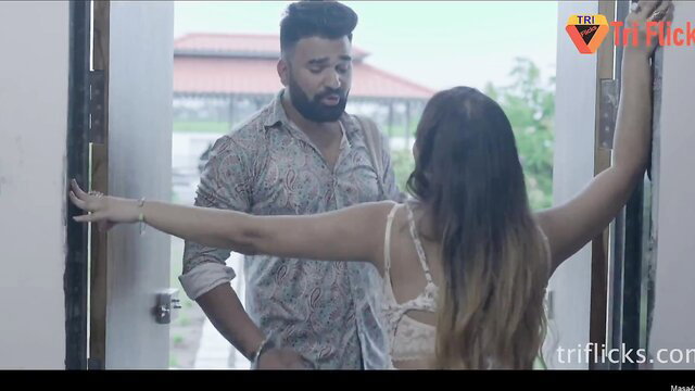 Indian couple foreplay: bearded hunk embraces busty brunette in lingerie