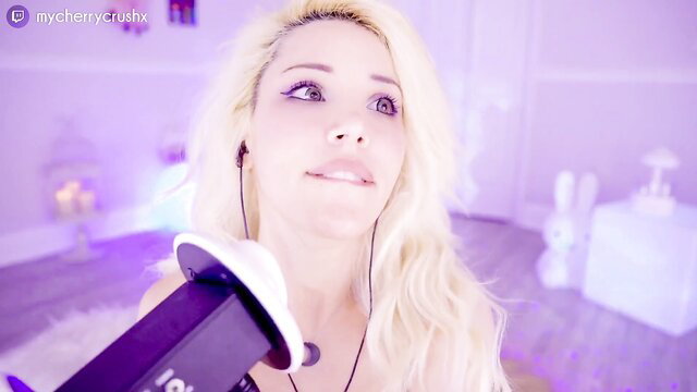 Blonde bombshell Cheche in lingerie teases on cam with mic