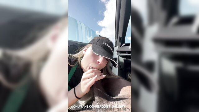 Blonde amateur smokes cigarette in car, hat on, seductive pout closeup