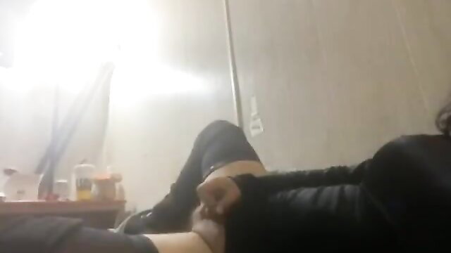 Latina sissy slut in stockings gives handjob closeup