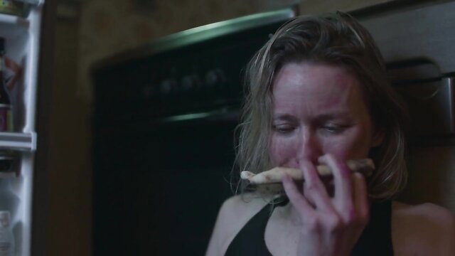 Naomi Watts eating toast in tank top, hot cleavage Infinite Storm scene