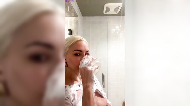 Lindsey Pelas drinking in see-through top, blonde tits tease