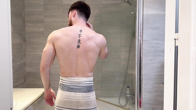 Max Dennison muscular back tattoo in towel, sexy post-shower tease