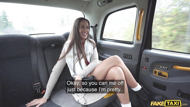 Lara Lee in white cardigan and skirt in cab, Fake Taxi