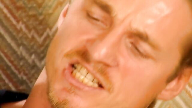 Intense closeup of man grimacing in ecstasy, Free Pink Devil 1997 porn thumbnail