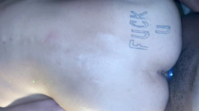 Brando Commando 'FUCK U' tattoo on big ebony ass in closeup