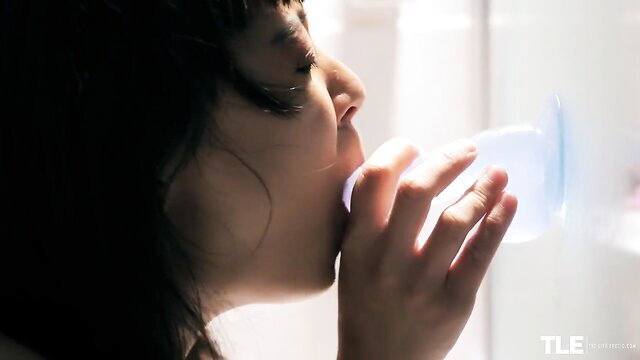 Akari Suka sucks blue balls toy closeup in TheLifeErotic