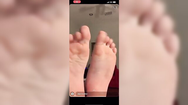 Closeup of dude's smooth bare soles and toes in amateur foot fetish video
