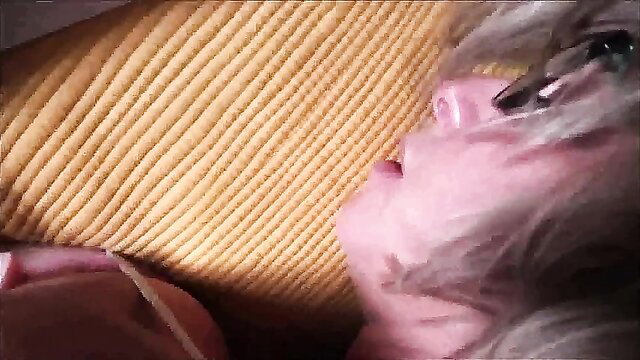 Busty blonde stepmom with glasses reading novel, mouth open seductively