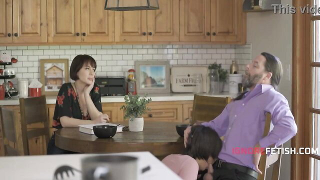 Asian mom and daughter under table sucking mature man's cock