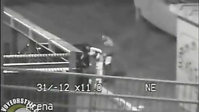 Parking lot shag on security cam: couple fucking by conveyor belt