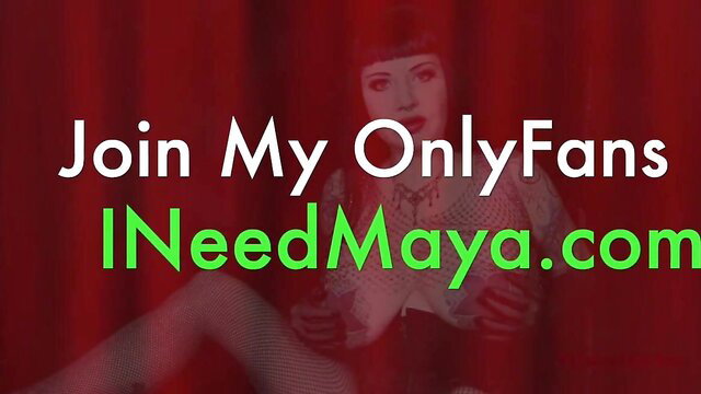 Seductive brunette in lingerie teases on red curtain, join OnlyFans INeedMaya.com