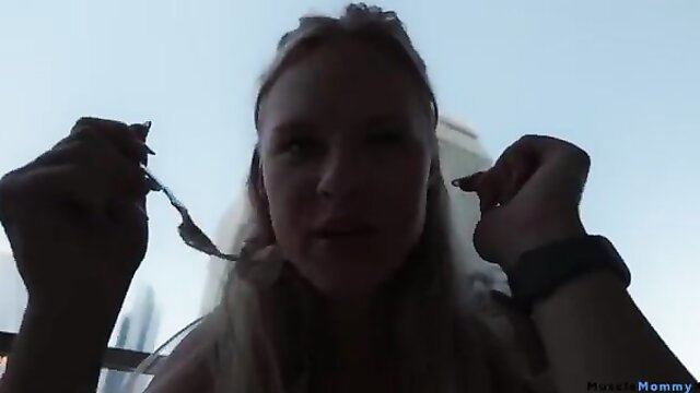 Blonde woman holding tweezers