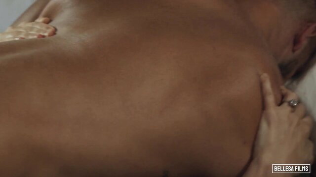 Cherie DeVille massages hot guy's back in steamy massage scene