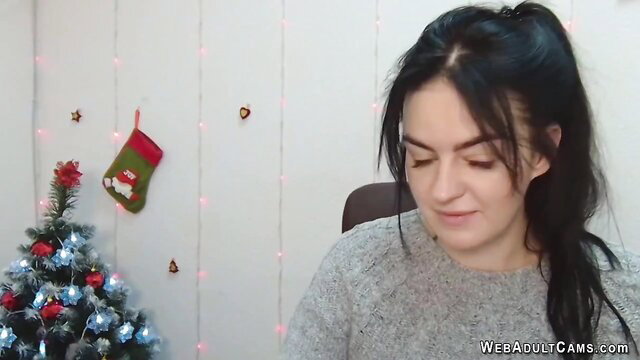 Brunette Ukrainian amateur babe in sweater on Christmas webcam solo