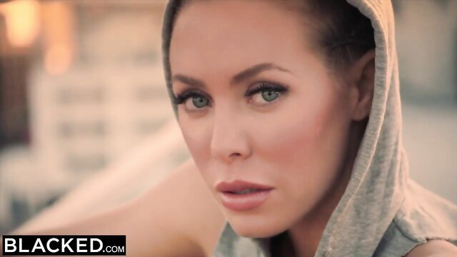 Hot blonde with hoodie post-workout, sultry gaze, perfect for BBC fantasy