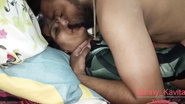 Bearded Indian man passionately kisses busty desi wife in bed