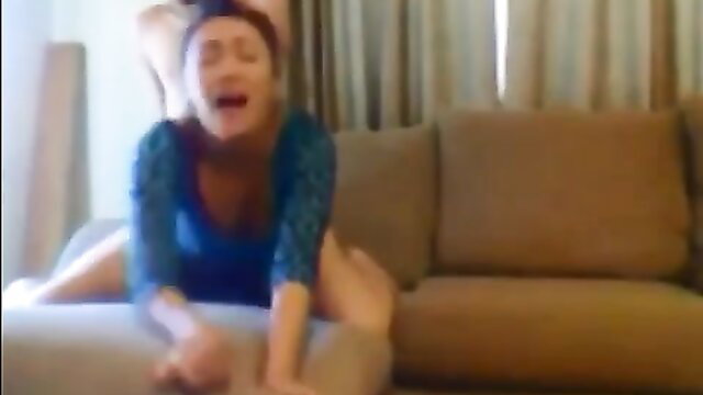Amateur Asian girl in blue top spread legs fucked on couch